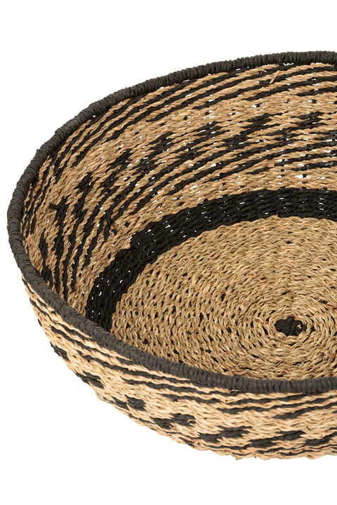 Detail van de gevlochten structuur van J-Line Mand Low met zwart-naturel patroon.