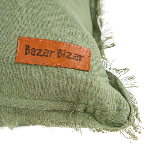 Detail Bazar Bizar logo op groen kussen The Minty Fresh