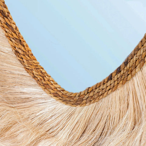 Close-up van de natuurlijke abaca vezels en afwerking aan de onderzijde van het frame