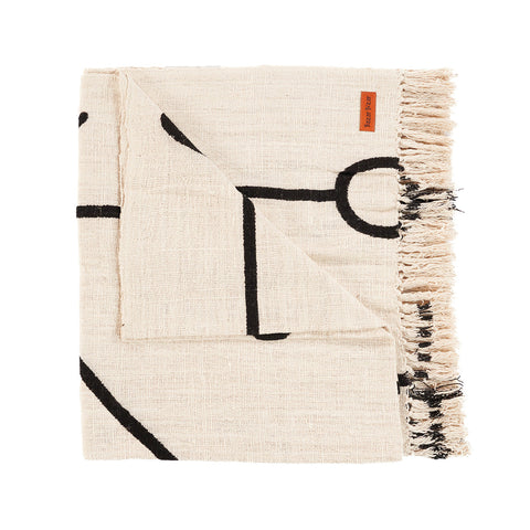 Bazar Bizar The Evil Eye katoenen plaid in naturel en zwart, netjes opgeplooid