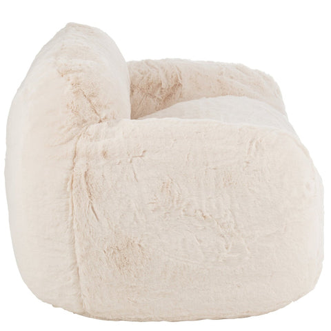 Zijkant van de beige J-Line Cutie Cream Large zetel