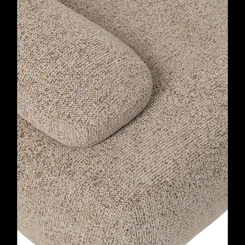 Detail van de afgeronde hoek van de J-Line Olivia modulaire zetel in bruin en ecru.