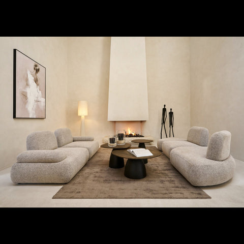 J-Line Olivia modulaire zetel opgesplitst in twee delen in een warm beige interieur.