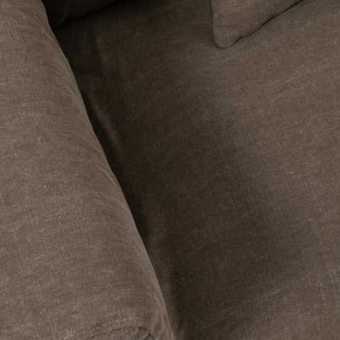 Detail van de linnen structuur van de J-Line Monaco zetelhoes in Desert Taupe.