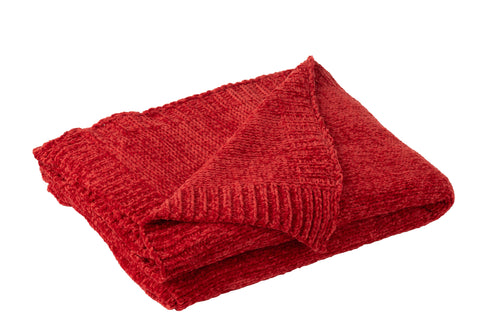 Rood chenille plaid met omgeslagen hoek voor textuurdetail.
