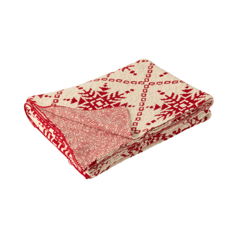 Opgeplooid plaid met rood-wit sneeuwvlokkenmotief