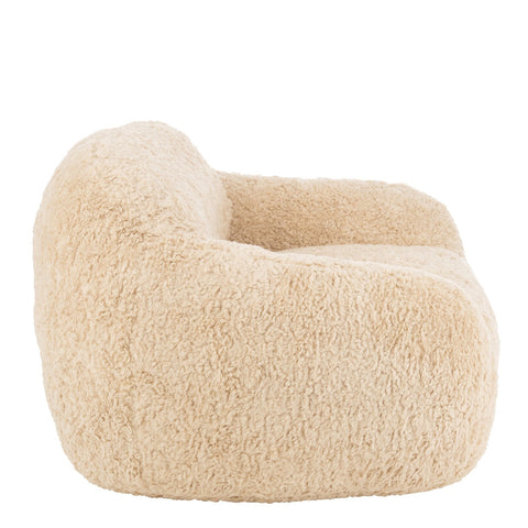 Zijkant van de beige J-Line Shearl Small zetel