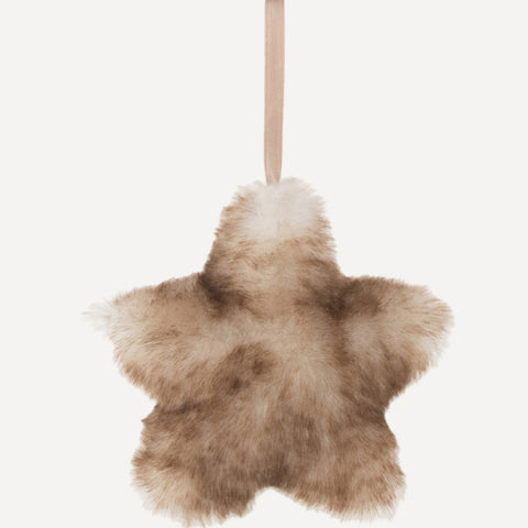 Detail van pluche kerstornament in stervorm