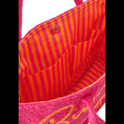 Detail van de oranje-roze gestreepte binnenkant van de J-Line Bisous strandtas