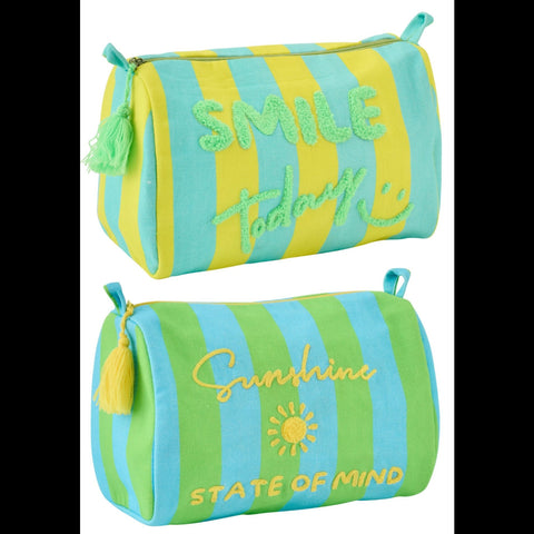 J-Line Sunshine Smile toilettassen gecombineerd met kleurrijke modeaccessoires tegen turquoise achtergrond